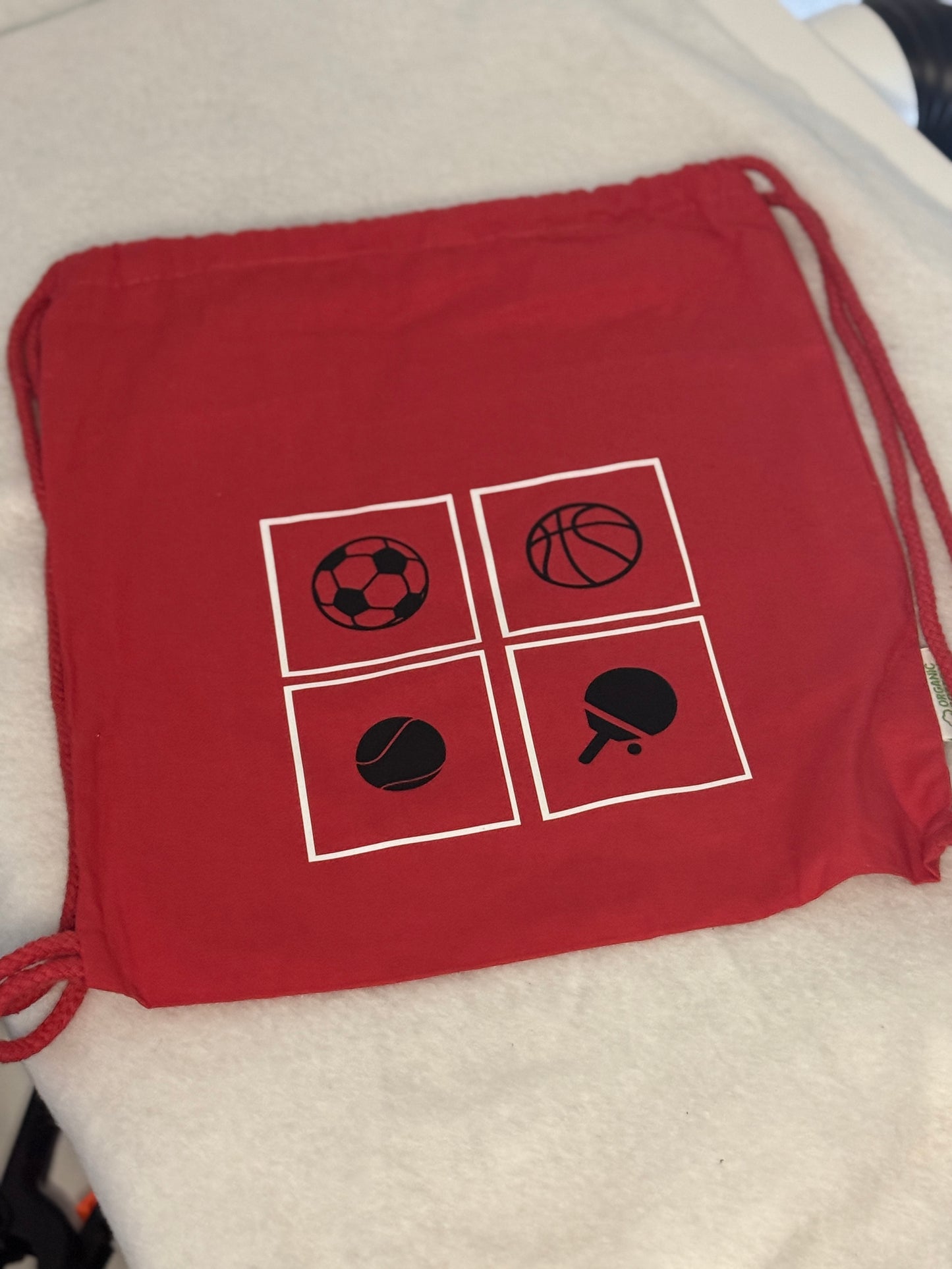 Bio-Baumwolltasche, nachhaltiger Turnbeutel in rot "vier Ballsportarten"