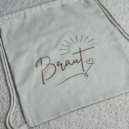 Nachhaltige Kordelzugtasche, JGA-Beutel in weiß "Braut"