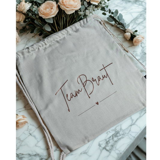 Nachhaltige Kordelzugtasche, JGA-Beutel in weiß "Team Braut"